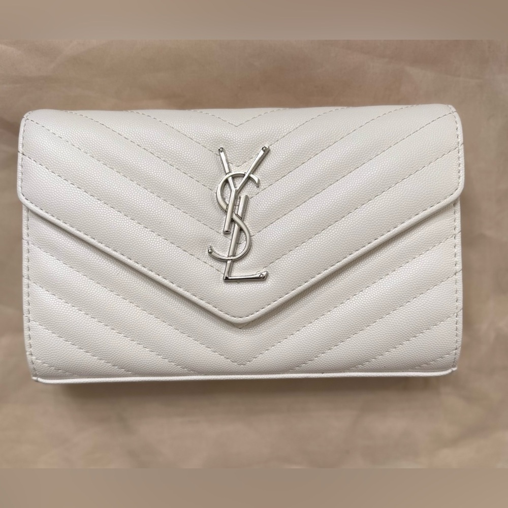White YSL bag with silver details. 
Worn once. 
Excellent condition.
